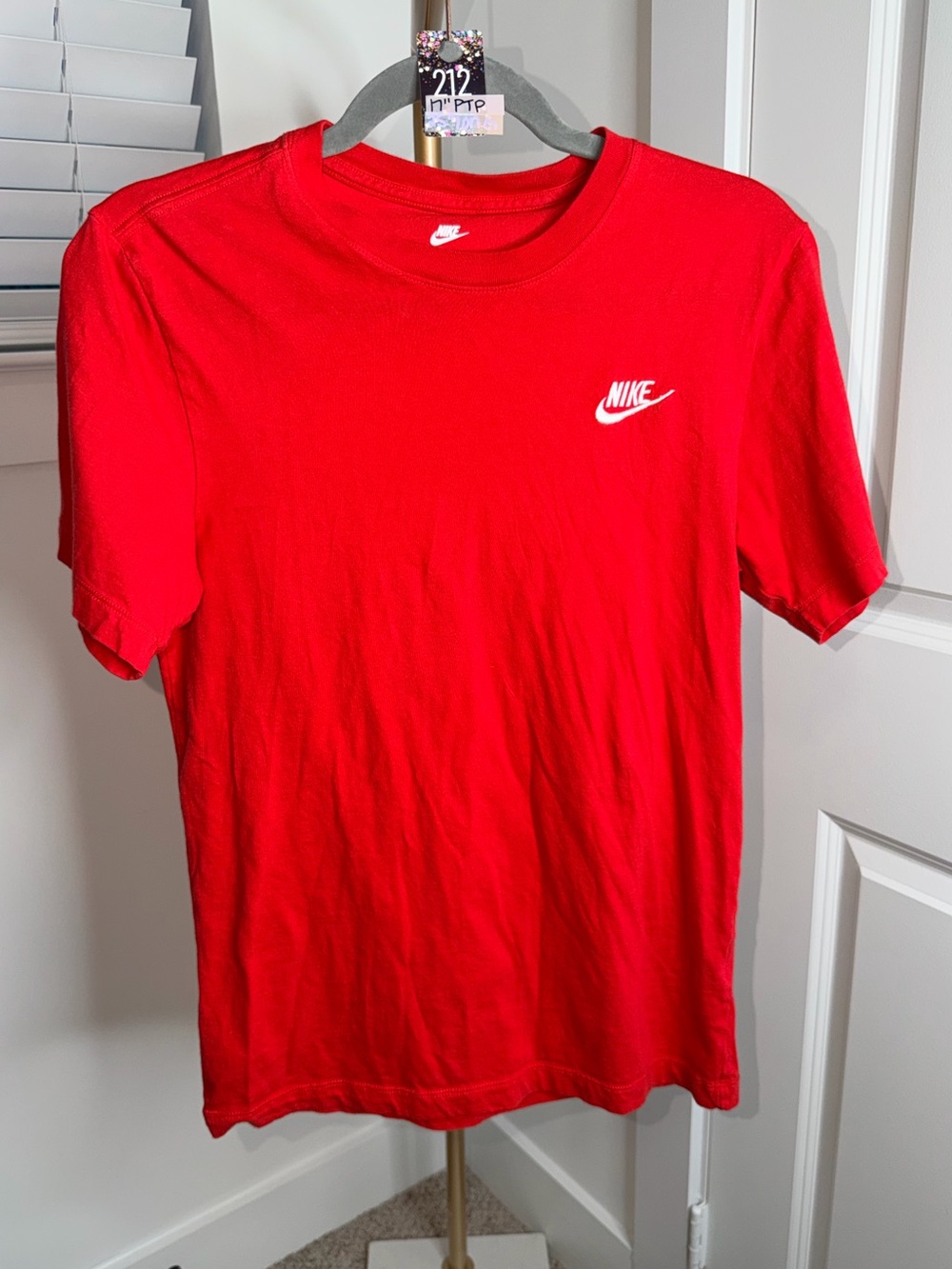 212. Nike Sportswear Club Essentials Women's T-Shirt in University Red